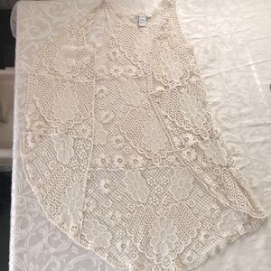 Cream sleeveless cardigan